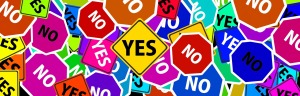 Yes and No road signs in different colors.